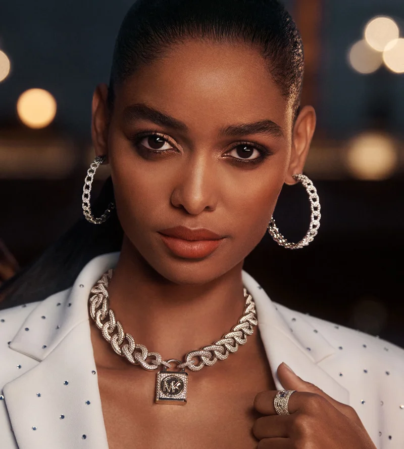 LUXE UNLOCKED Finished with a finished with a pavé-encrusted padlock charm, our bold, curb-link necklace is the season’s most glamorous gift.