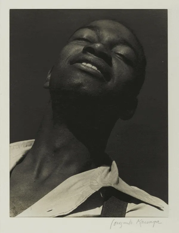A GIF of “Kenneth Spencer” by Consuelo Kanaga and “Youth (Head in Wood)” by Nancy Elizabeth Prophet