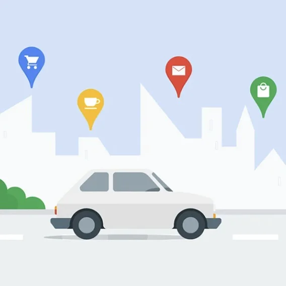 Illustration of a car with four Google Maps icons above it.