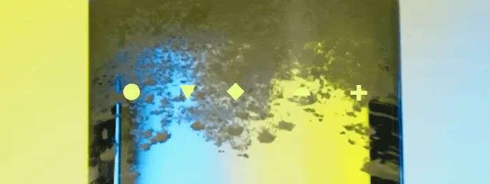 Animated-style frame of colostrum powder swirling in liquid with simple geometric icons overlaid.