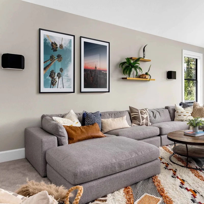 Framed prints of vacation destinations.
