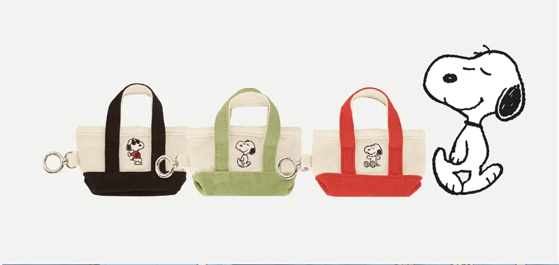 Snoopy poop bag holder
