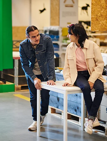 couple shopping the as-is section in IKEA store