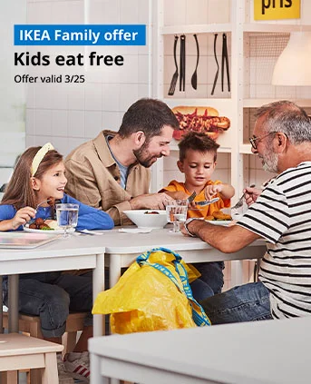 Family sitting at IKEA restaurant.