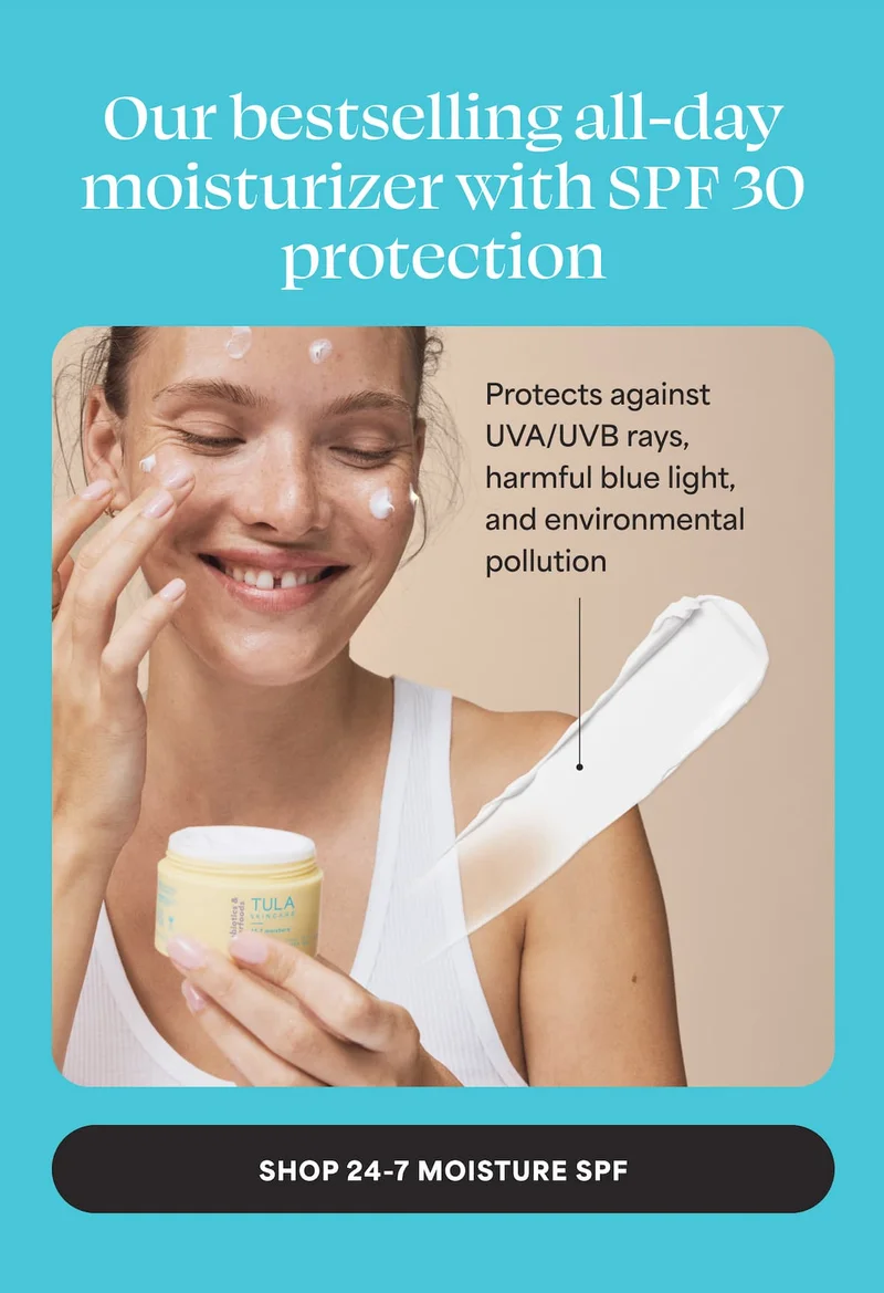 an image of a woman applying her face with a moister
