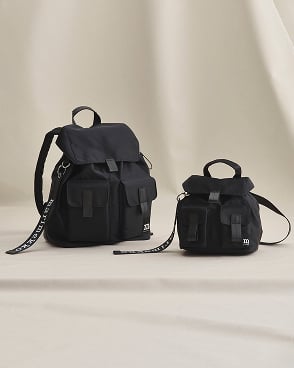 Small and large black everything backpacks.