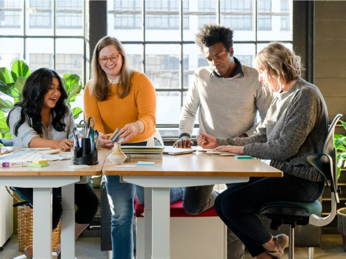 People working together on workstations