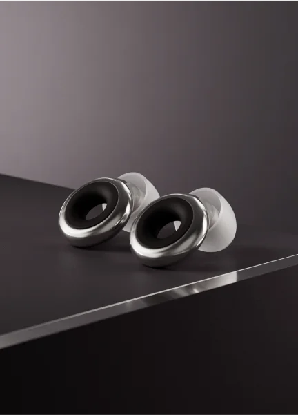 The silver Loop Experience earplugs.