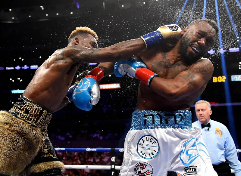 Jermell Charlo (gold shorts) fights Austin Trout (white shorts) in their WBC Super Welterweight Title bout at Staples Center on June 9, 2018 in Los Angeles.