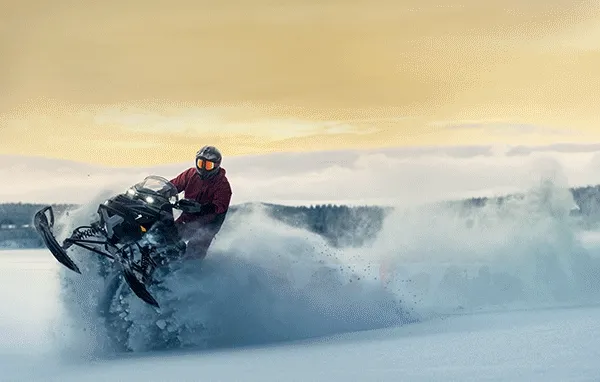 Images of riders with Lynx sled