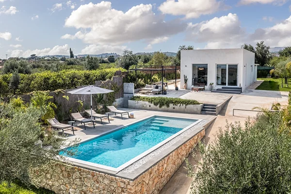 Enjoy sun-kissed days by the pool in Sicily, Italy.