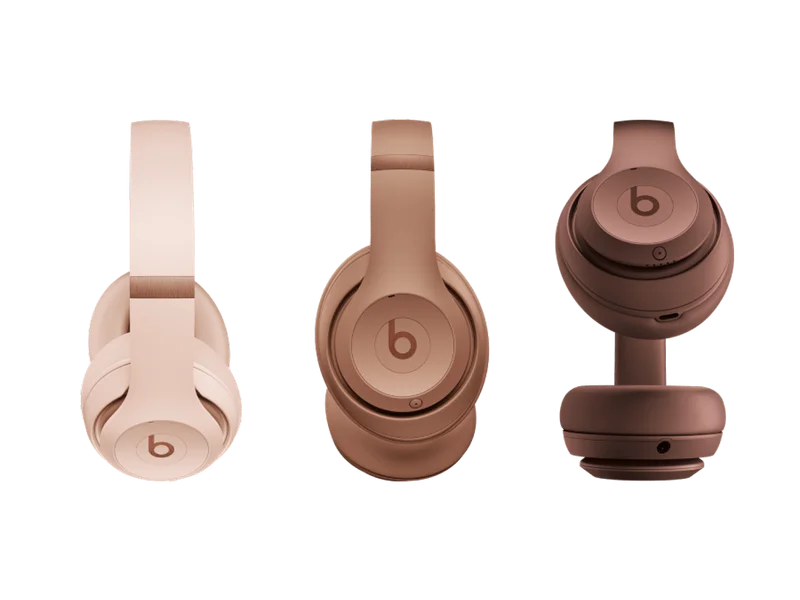 Beats Studio Pro headphones in Moon, Dune and Earth.