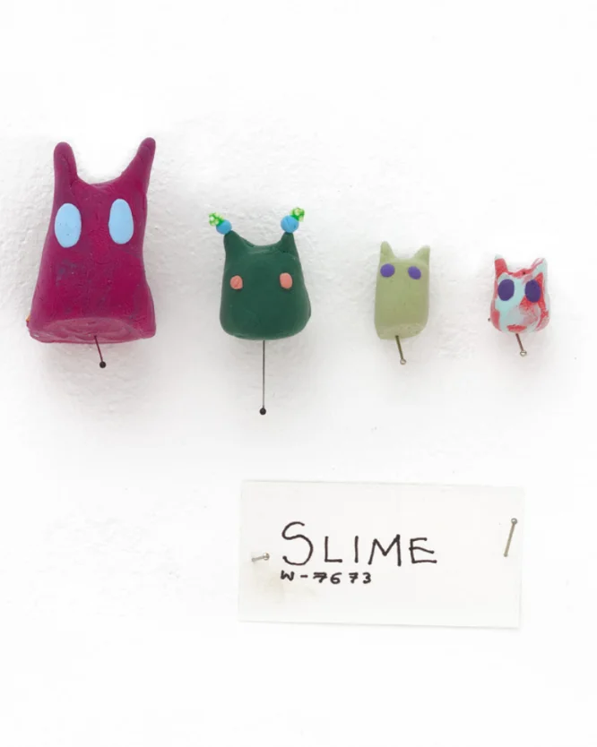 A photograph of creatures made of clay with eyes and pointed ears, part of Do Ho Suh’s “Artland”