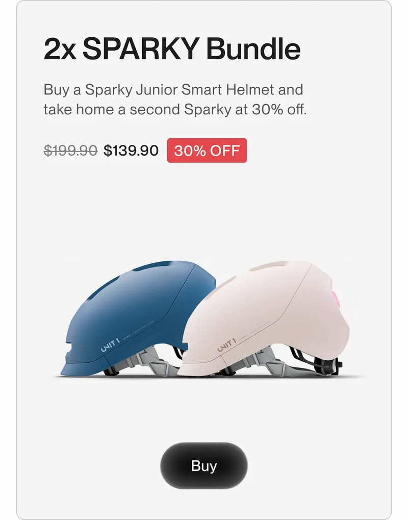 wo Sparky Junior Smart Helmets in blue and pink displayed together.