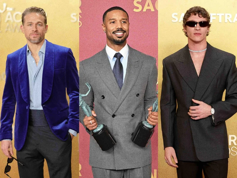 Image may contain: Michael B. Jordan, Clothing, Formal Wear, Suit, Blazer, Coat, Jacket, Accessories, Tie, Adult, and Person