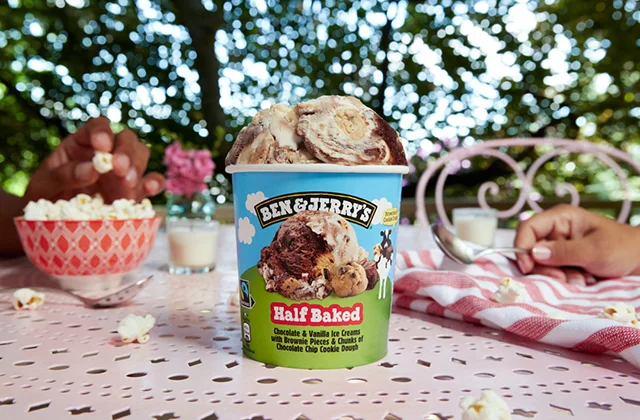 Pint of Ben & Jerry's Half Baked in a summer setting.