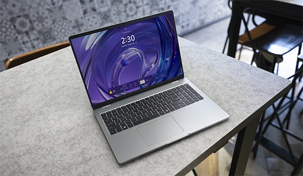 Close-up of Table with Dell Pro 16 inch Laptop