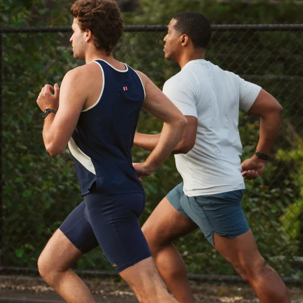 Two men running together