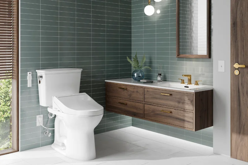 A TOTO WASHLET C5 in a sage tiled bathroom