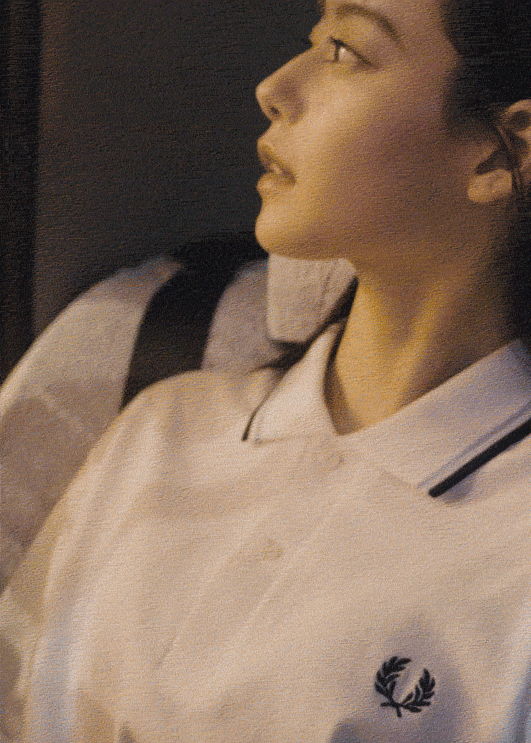 Man wearing knitted Fred Perry Shirt