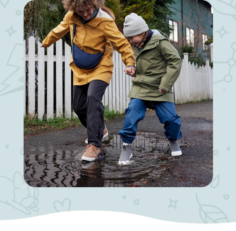 Graphic of two kids walking in the rain wearing Vessis.