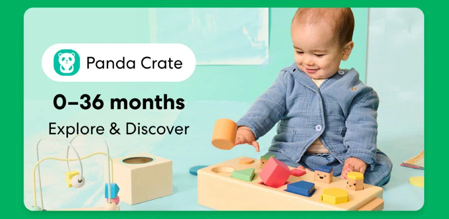 Baby playing with a KiwiCo Panda Crate toy. Designed for ages 0–36 months to explore and discover.