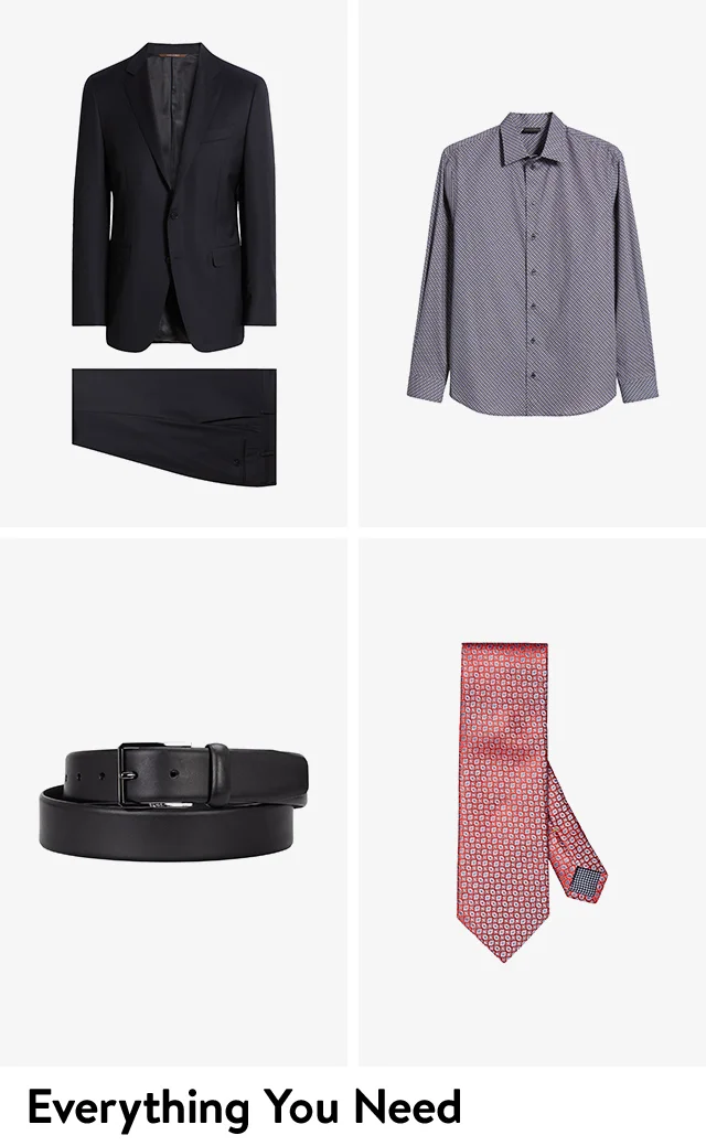A dark suit, dress shirt, belt and tie.