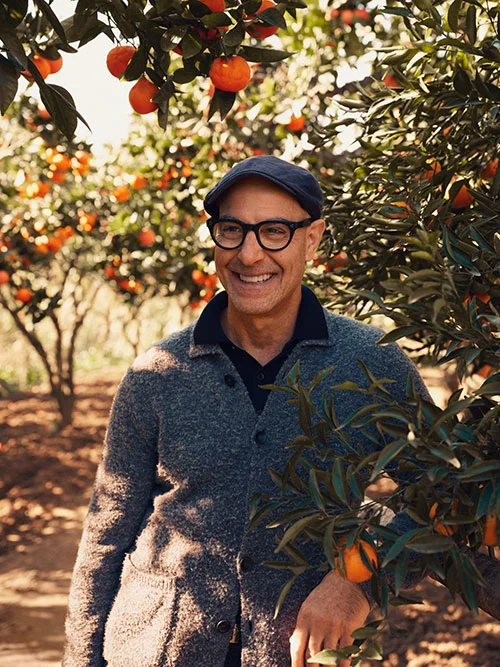Stanley Tucci in blood orange orchard near Mount Etna