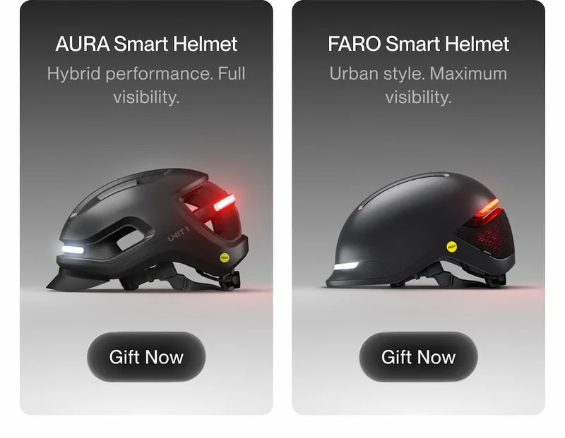 UNIT 1 AURA Smart Helmet and FARO Smart Helmet shown side by side with integrated front and rear lights, highlighting hybrid performance and urban visibility, each with a “Gift Now” button.