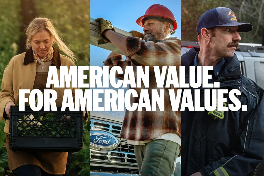 A woman carrying a box, a man carrying lumber in front of a Ford truck, and a first responder in front of a vehicle.