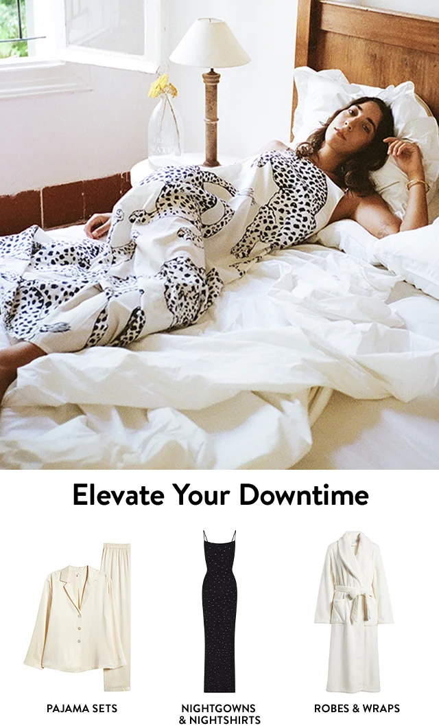 A woman wearing a printed nightgown. A white pajama set, black nightgown and white robe.