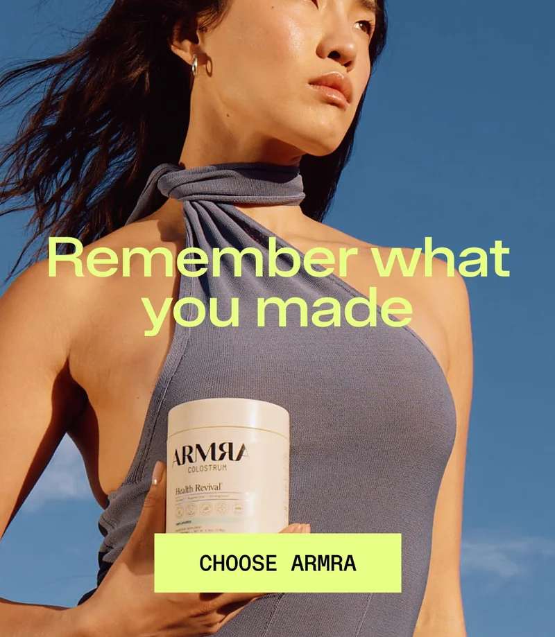 Person holding ARMRA Health Revival jar against blue sky; text reads ‘Remember what you made.’ Button reads ‘Choose ARMRA.’