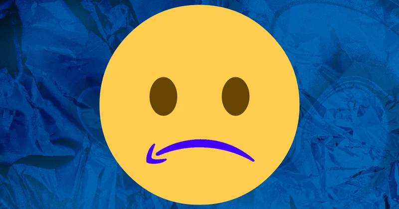 On a blue background, a large yellow frowning face emoji, with Amazon’s arrow logo making up the mouth.
