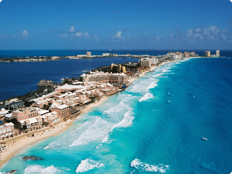 Image Description: An aerial view of resorts along the coast of Quintana Roo in Cancun