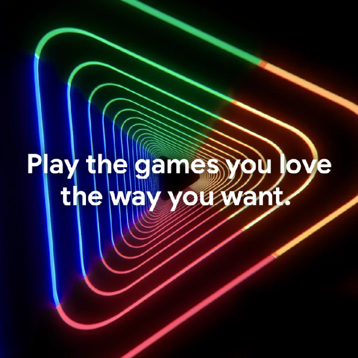 Neon rainbow triangle tunnel with text: 'Play the games you love the way you want.'