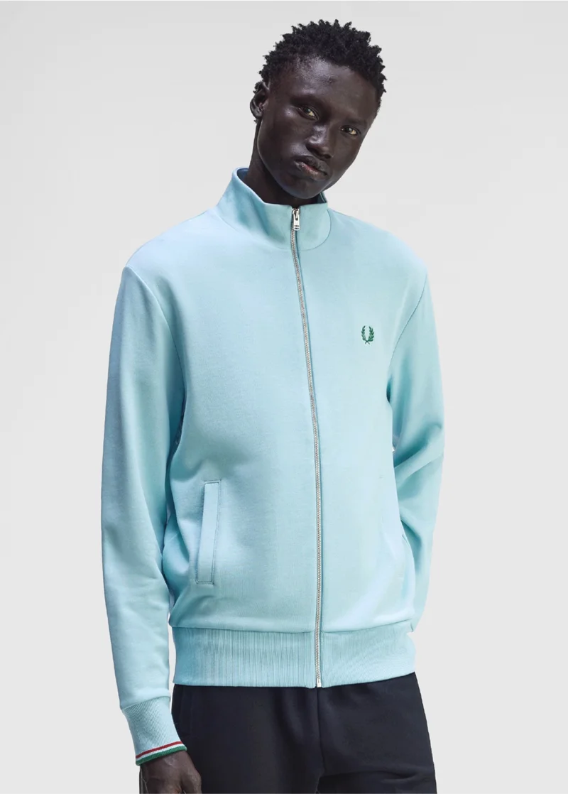 Male model wears sky blue full front zip track jacket