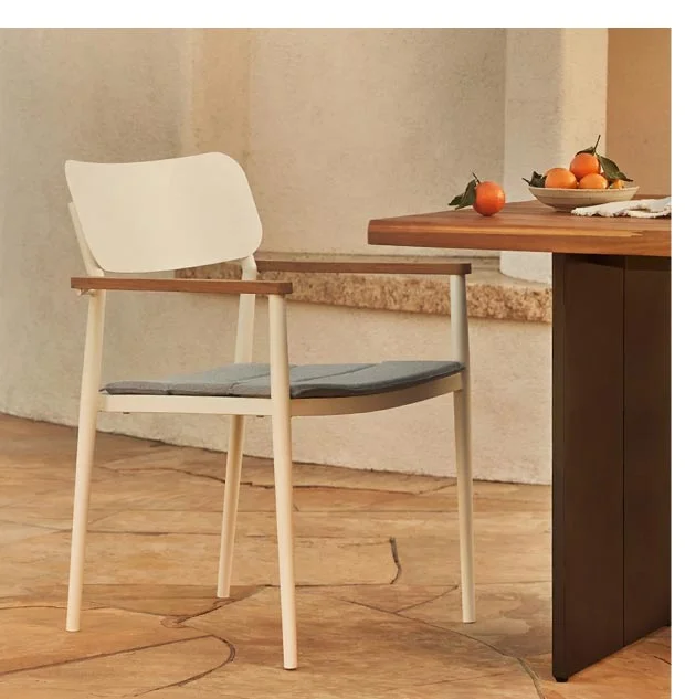 Elan white stackable dining chair.