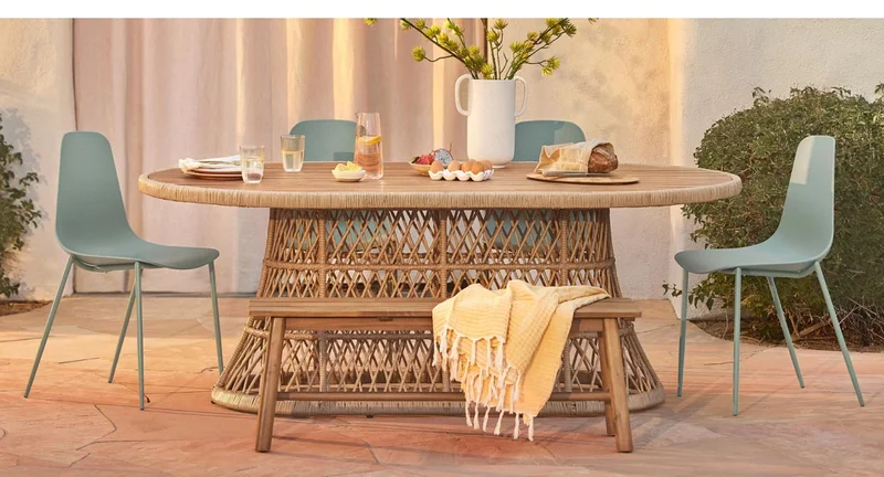Calliope natural oval dining table.