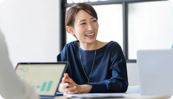 Person smiling in a meeting