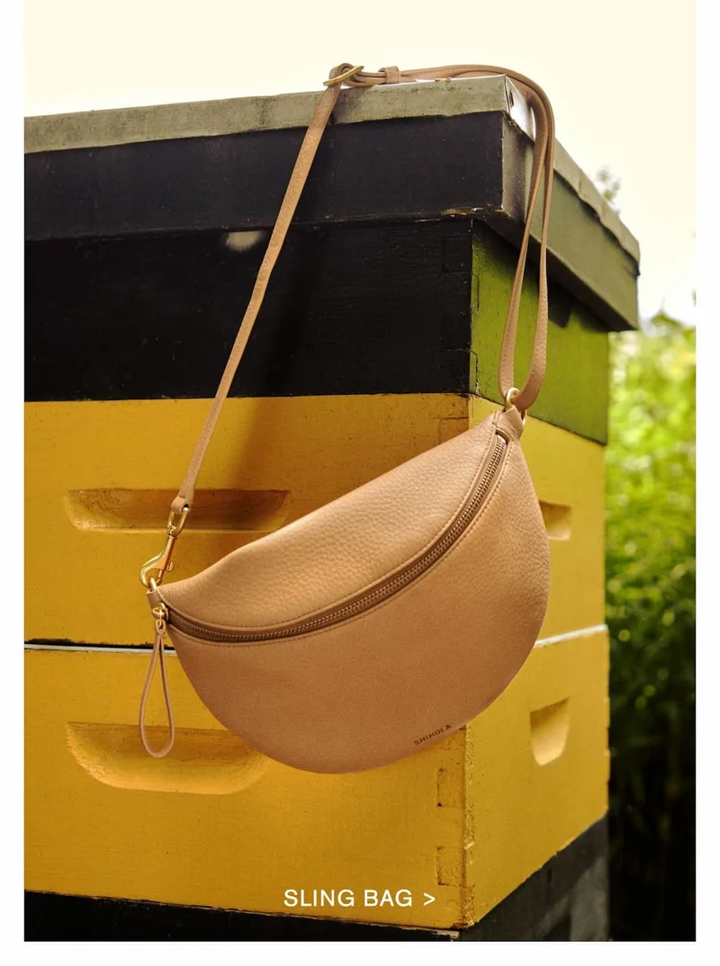 SLING BAG >