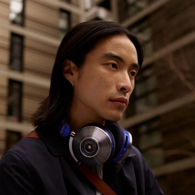 A man wearing Dyson Zone™ noise cancelling headphones