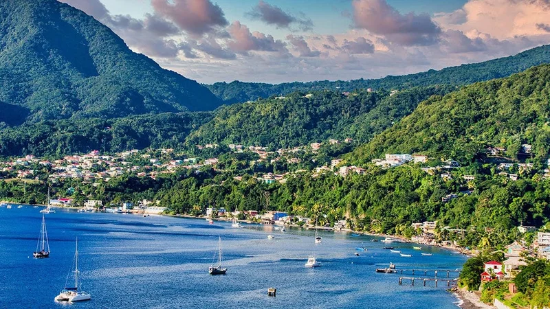 Image description: Boats in the harbor at Rosseau, Dominica.