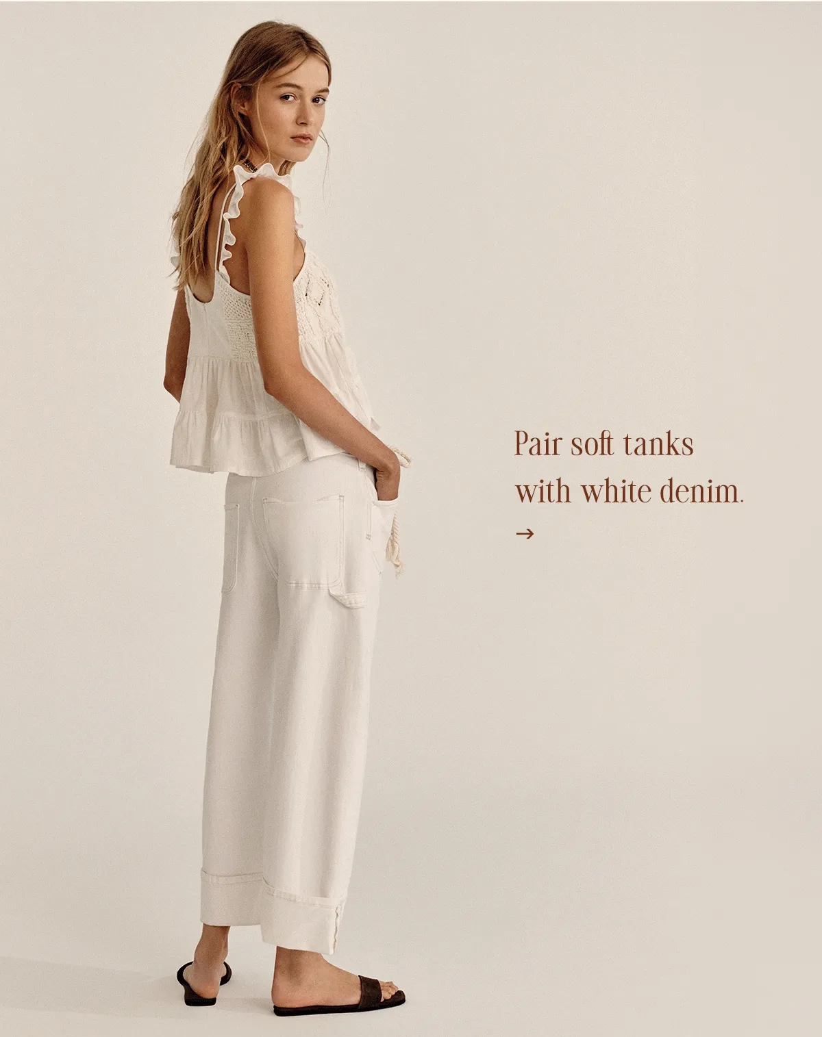 pairs soft tanks with white denim