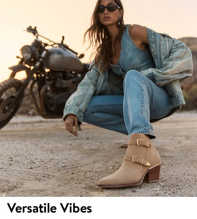 Woman wearing Dolce Vita booties.