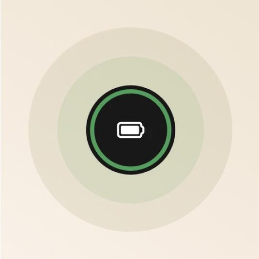 A graphic. A battery icon is contained in a black circle, with two further concentric rings that fade in colour intensity.