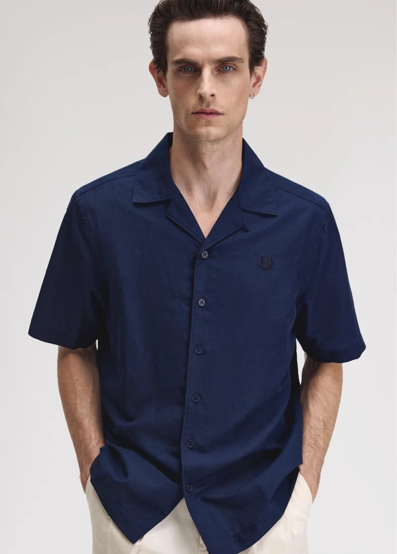 Male model wearing a Fred Perry Linen Blend Revere Collar Shirt in Tennis Blue