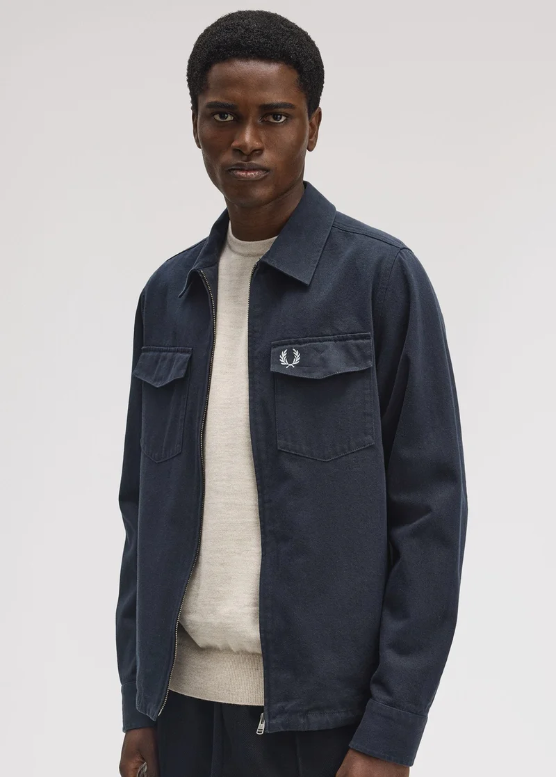 Male model wearing a Fred Perry Twill Zip Through Overshirt in Navy