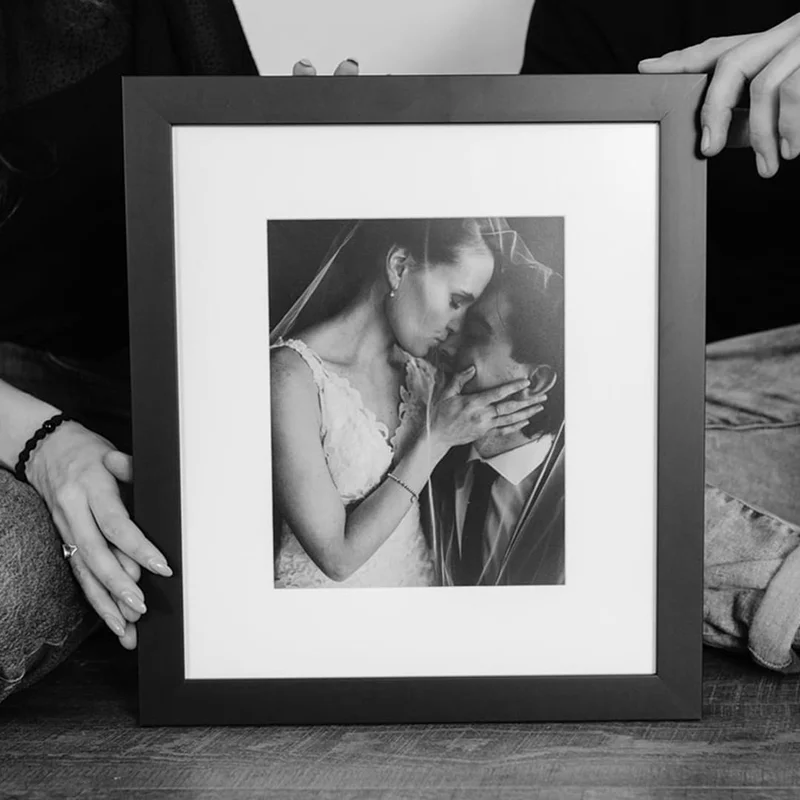 Framed print of married couple.