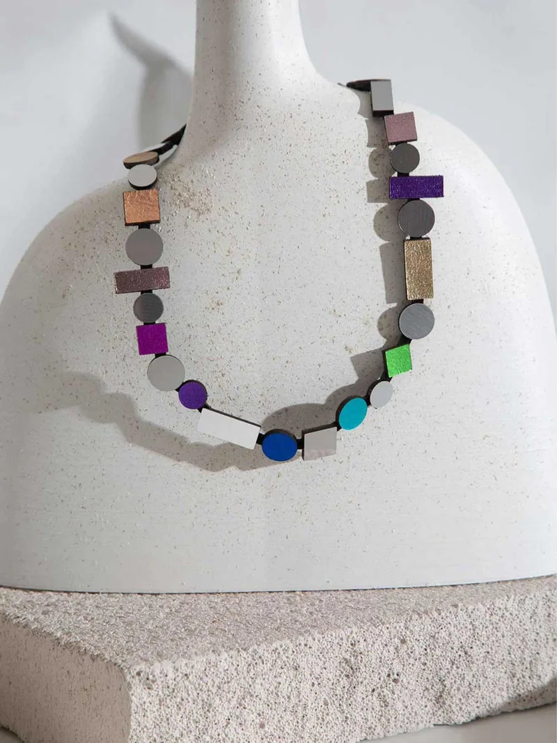 Necklace made up of colorful shapes