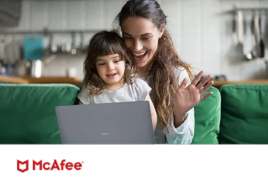 A parent and young child enjoying a web call on the parent’s computer, protected by McAfee Plus Premium.